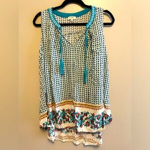 Women’s UmGee top, Size L